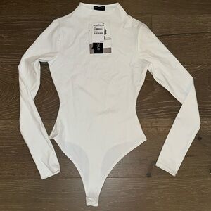 White long sleeved bodysuit